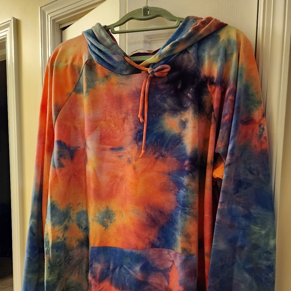 Bright lightweight tie-dyed sweatshirt with kangaroo pocket in front.